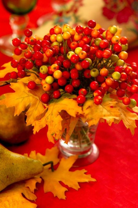 fall decoration with red and yellow berries and leaves